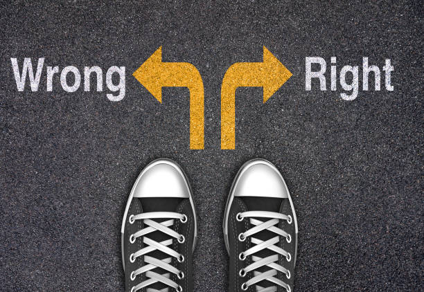 istock Wrong or Right arrows written on the road 1326973523