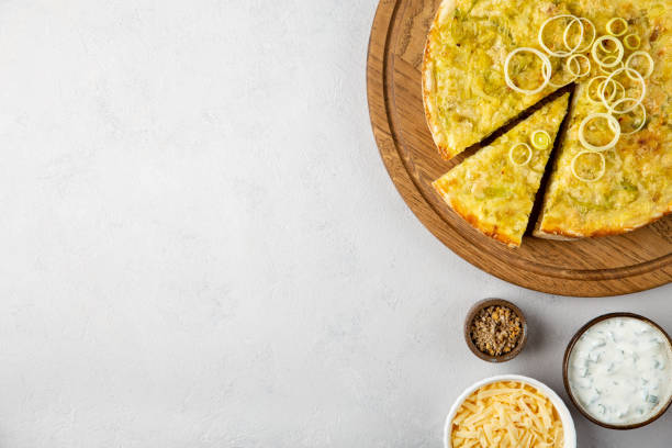Delicious vegetarian pizza with arugola, olives, zucchini, corn and pepper.