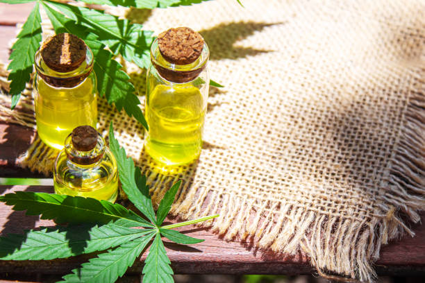 istock Cannabis extract essential oil in a small bottle. Selective focus. 1326975666