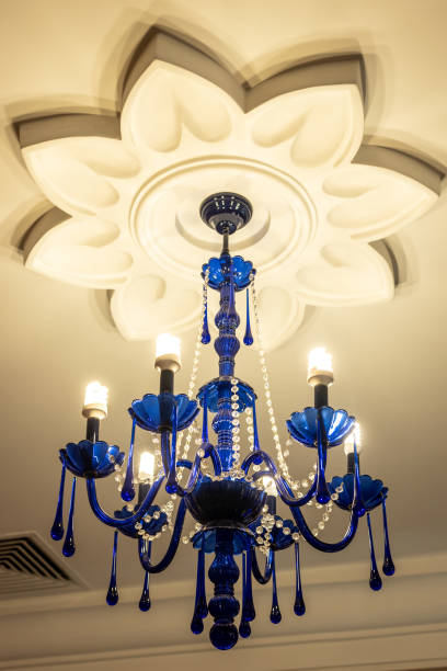 istock Amazing blue luster on ceiling with decorative flower 1326977062