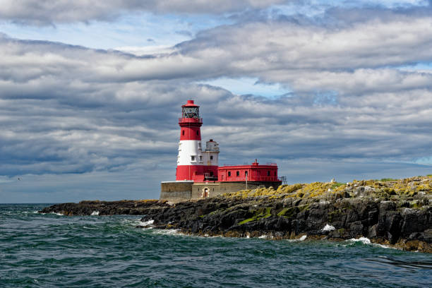 Longstone Lighthouse in the farne Islands - United Kingdom Longstone Lighthouse - situated on the Outer Farne Islands on the Northumberland Coast in Northern England - United Kingdom farne islands stock pictures, royalty-free photos & images