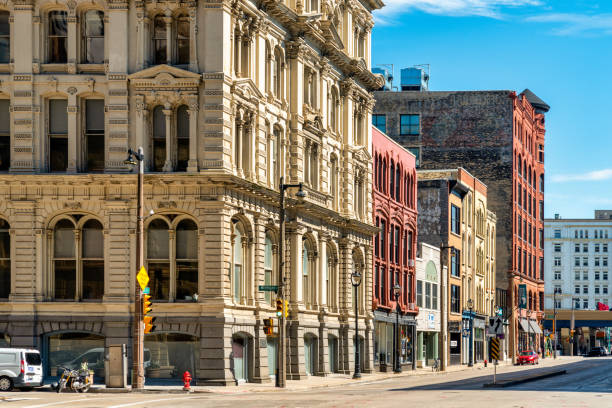 Standing on Monroe Street adjacent to the Illinois State Capitol Building in Springfield, Illinois, USA looking East towards the Downtown District.
