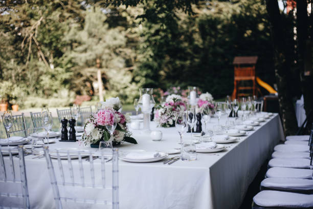 istock tableware Glasses, flower fork, knife served for dinner in restaurant with cozy interior 1326982563