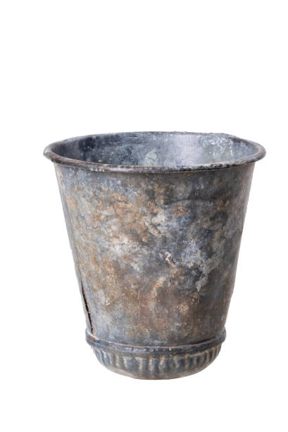 istock A special metal cup for obtaining resin from conifers. Accessories for forestry workers. Isolated background. 1326988321