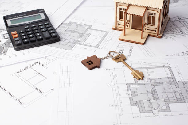 calculating the construction of the house, the layout of the house on the drawings, the cost of construction turnkey calculating the construction of the house, the layout of the house on the drawings, the cost of construction turnkey. turnkey project stock pictures, royalty-free photos & images