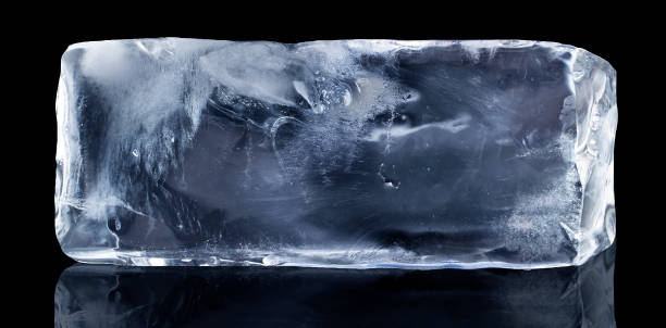 istock Rectangular block of ice isolated on a black background with clipping path. 1326991206