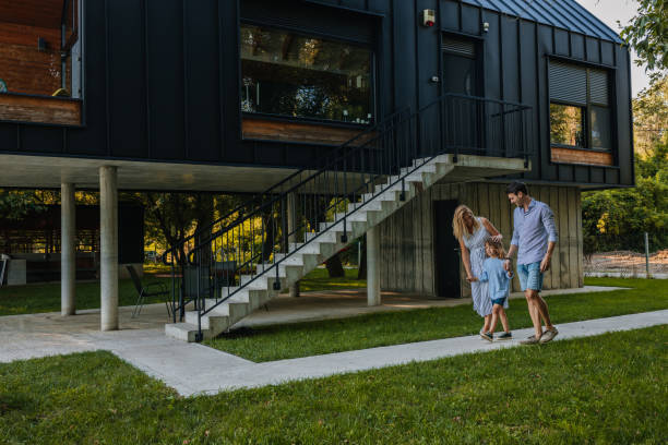 istock Parents and son enjoying sunny day in backyard 1326992847