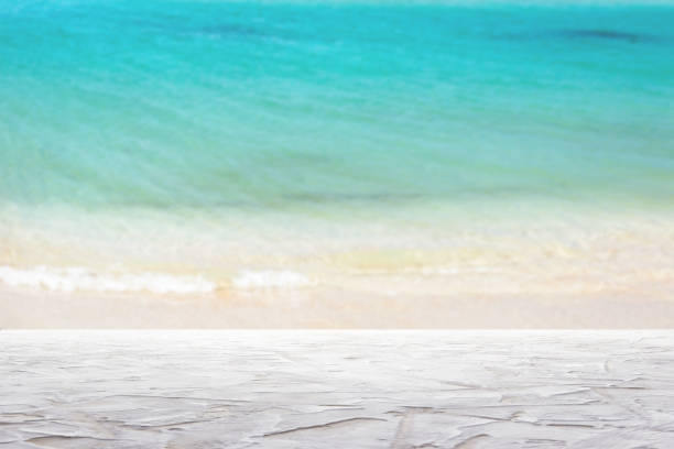 istock textured white surfaceon blur sea background - can be used for display or montage your products 1326993625