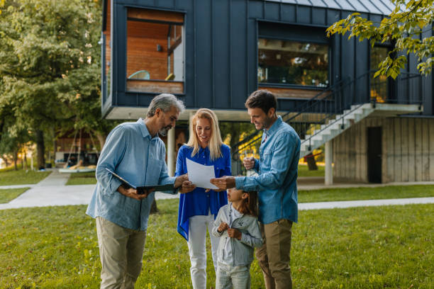 istock Just sign here, and house is yours 1326993637