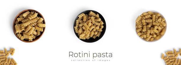 istock Rotini pasta isolated on a white background 1326995575
