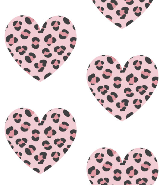 Vector seamless pattern of hand drawn flat pink heart with leopard cheetah fur print Vector seamless pattern of hand drawn flat pink heart with leopard cheetah fur print isolated on white background heart shape valentines day fur pink stock illustrations