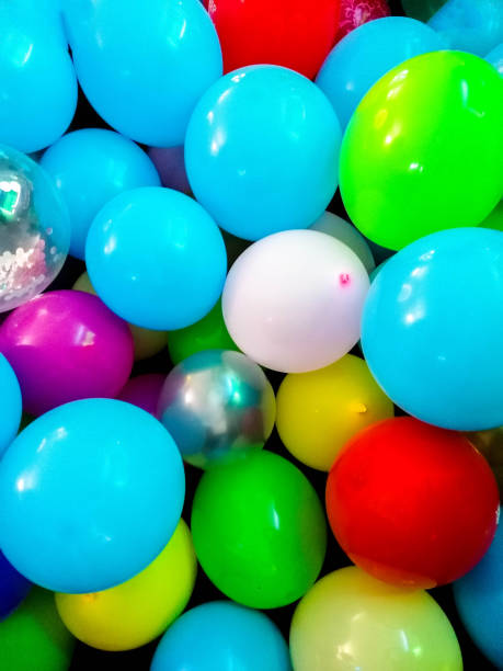 istock Piled Up Party Balloons 1327000062