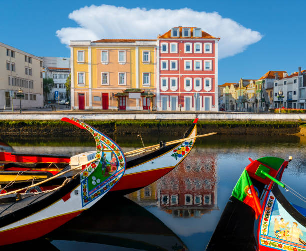 Aveiro. Boats in Aveiro canal. Cityscape in the city of Aveiro. Moliceiros boats in the Ria de Aveiro. gondola traditional boat photos stock pictures, royalty-free photos & images