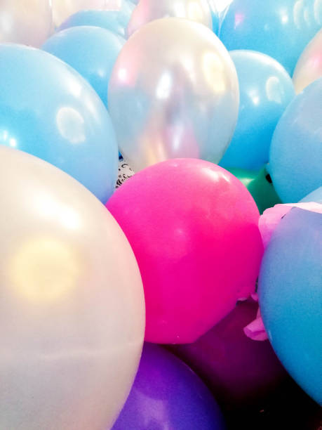 istock Piled Up Party Balloons 1327003282