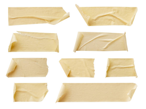 istock Yellow adhesive paper tape isolated on white background 1327007612