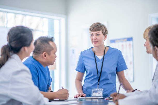 istock Nurse presents to group of medical students 1327008003