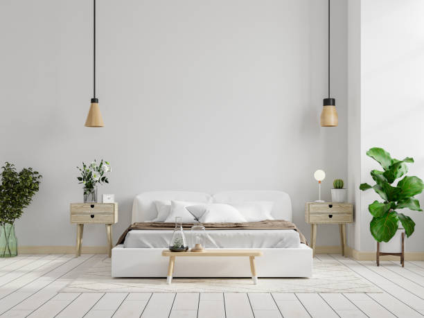 istock Mockup white wall in bedroom interior background. 1327021388