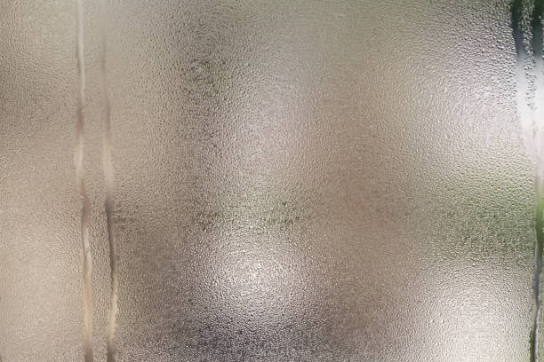 istock Drops of water on glass 1327021395