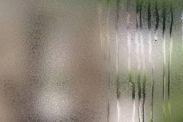 istock Drops of water on glass 1327021404