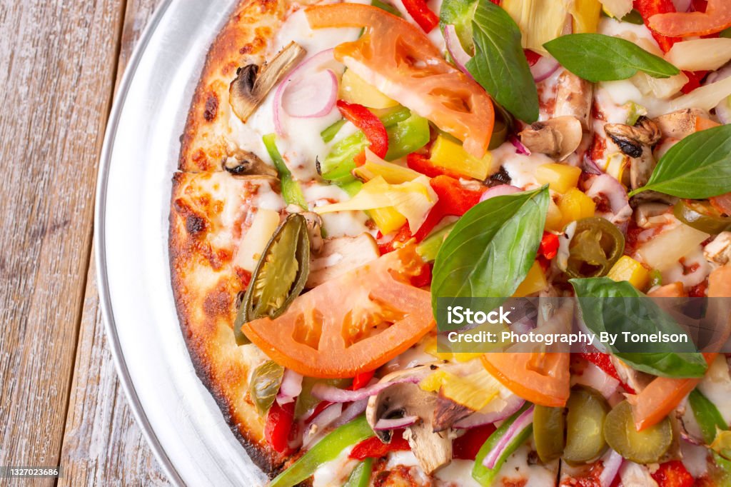 TD Cali pizza A top down view of a California vegetarian pizza. Agriculture Stock Photo