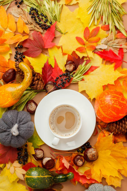 istock Autumn flat lay composition with dry leaves background and coffee latte spicy tea cup. Creative autumn, thanksgiving, fall, halloween concept. Top view, copy space, seasonal menu, invitation, flyer 1327023849