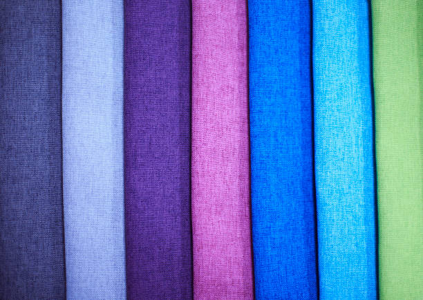 istock Textile samples. Textile samples for curtains. Blue purple, green tone curtain samples hanging. 1327025614