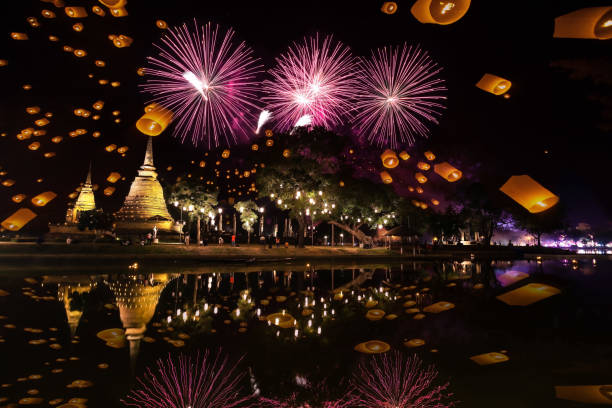 firework of loi krathong festival showing in sukhothai historical park. sukhothai, thailand. - sukhothai stok fotoğraflar ve resimler