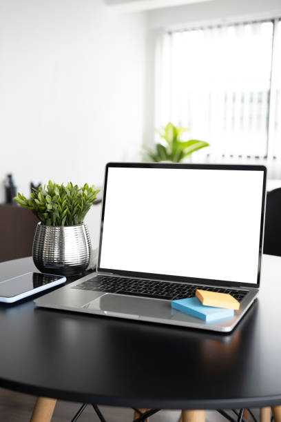 istock Mock up computer laptop on office desk. 1327027934