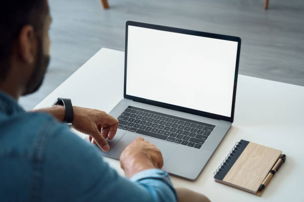 istock Over shoulder view of white blank empty mockup laptop screen for advertising 1327028593