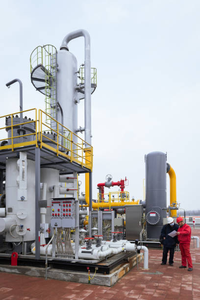 istock Engineers and staff communicate on site in chemical plant 1327028612