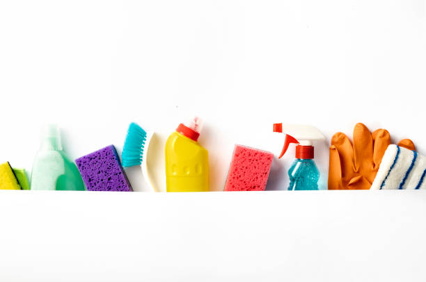 istock Set of various cleaning supplies on white background with copy space, top view 1327031602
