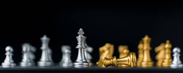 istock chess board game in competition play, Ideas business success concept 1327036700