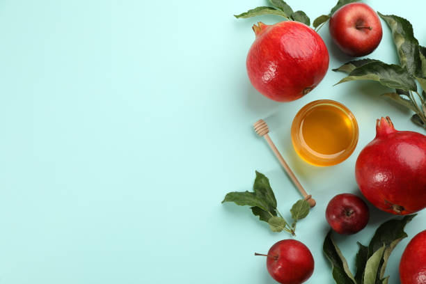 istock Flat lay composition with Rosh Hashanah holiday attributes on light blue background. Space for text 1327043110