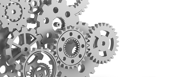 Gear concept in 3D: A group of mechanical gear icons with large copy space. Interlocked parts working together in harmony. Teamwork and togetherness in business teams. The complexity in communication between machinery and humans.