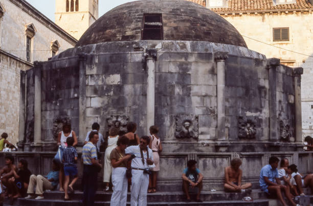 Dubrovnik, Croatia - aug 1985: Onofrio's Fountain is one of the most famous monuments in Dubrovnik and was built in 1438 as part of a water supply system.