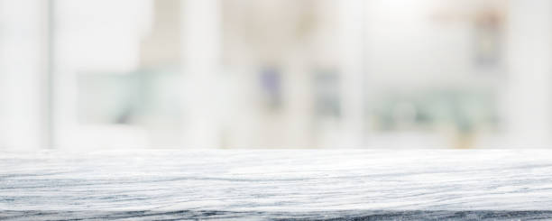 istock Empty white ceramic mosaic table top and blurred bokeh cafe and restaurant background with vintage filter - can used for display or montage your products. 1327046232