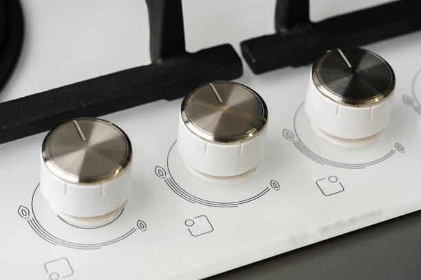 istock Knob switch on the electric stove close-up 1327047677