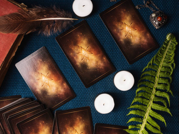 istock Divination cards and candles. View from above 1327050262