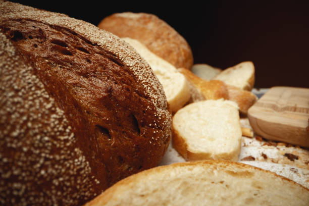 istock Cut bread assortment for a background, close up 1327051170