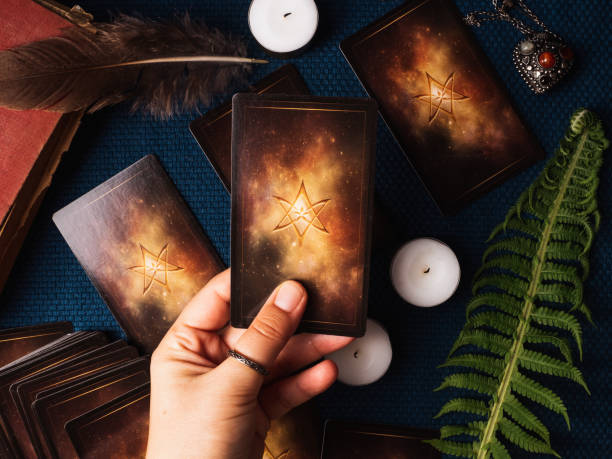istock Divination cards and candles. View from above 1327052276
