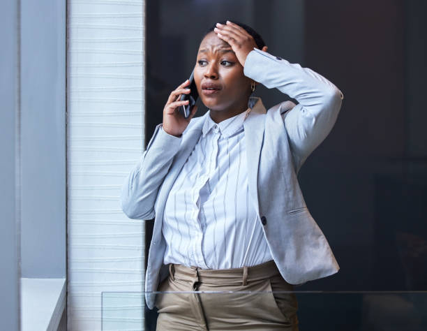 istock Shot of a young woman using her phone at work 1327053901