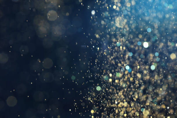 istock Blurred view of festive lights on blue background. Bokeh effect 1327054829