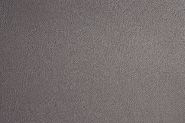 istock Flat gray fine texture of genuine leather. Natural expensive products 1327054841