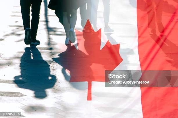 The National Flag Of Canada And Shadows Of People Concept Picture Stock Photo - Download Image Now