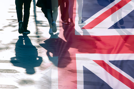 Shadows of People and UK Flag Citizens of Great Britain