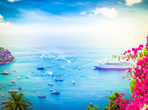 colorful coast and blue water with boats and ships, cote dAzur Provence, France, at summer
