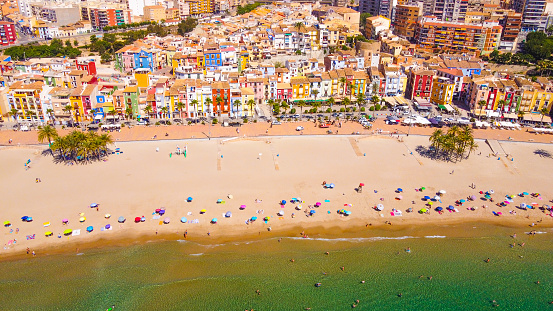 Villajoyosa beach from the air overhead view with its colorful traditional facades in Spain, the Costa Blanca of Alicante