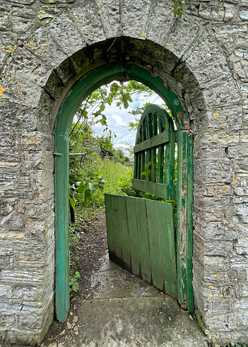 Walled garden entrance gate, Butleigh, Glastonbury, Somerset, England. This west country county offers much by way of distinctive architecture around and within Glastonbury town and environs, Somerset, England, UK