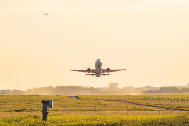 istock airplane take-off departure flight runway sunrise dust 1327064001