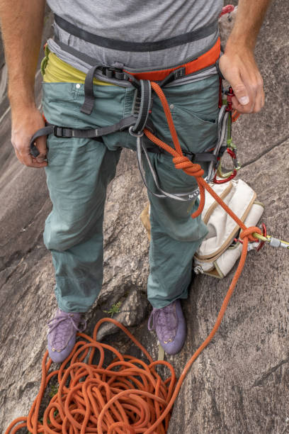 istock Low section of male mountain climber on rock face 1327069630